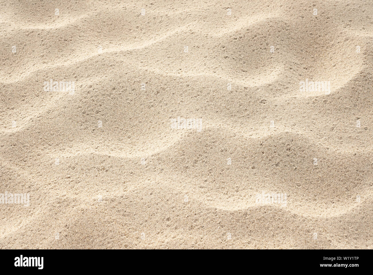 Background for design on the theme of the sea resort. Abstract natural pattern. Sand texture on the beach Stock Photo