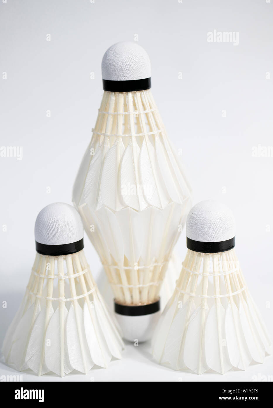 white badminton shuttlecocks lay on white table background Stock Photo