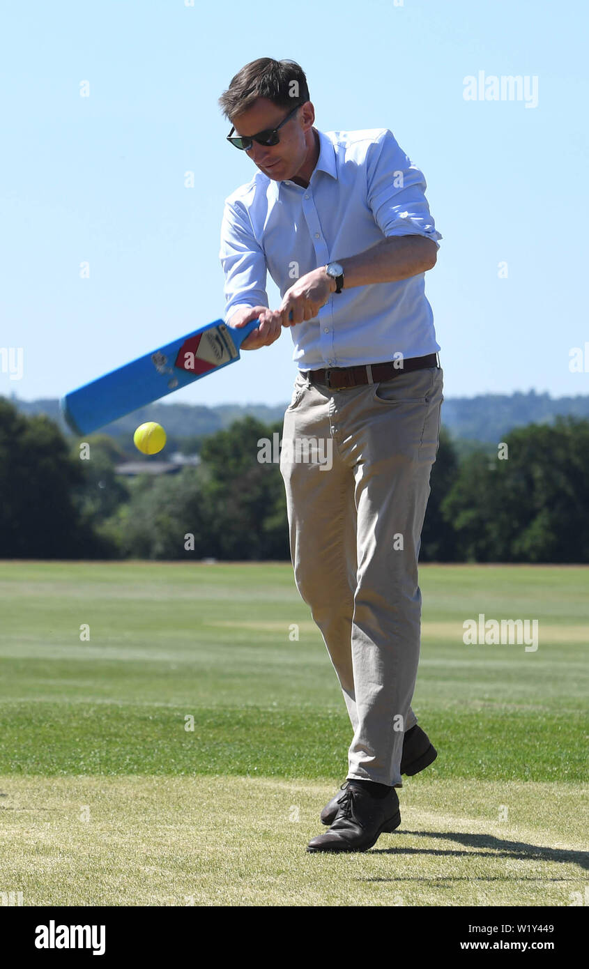 Conservative party leadership contender Jeremy Hunt tries his hand at cricket at the Surrey Para Games at the Charterhouse Club in Godalming. Stock Photo