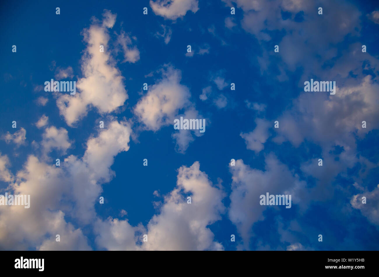 Sky background of colorful clouds at sunset Stock Photo - Alamy