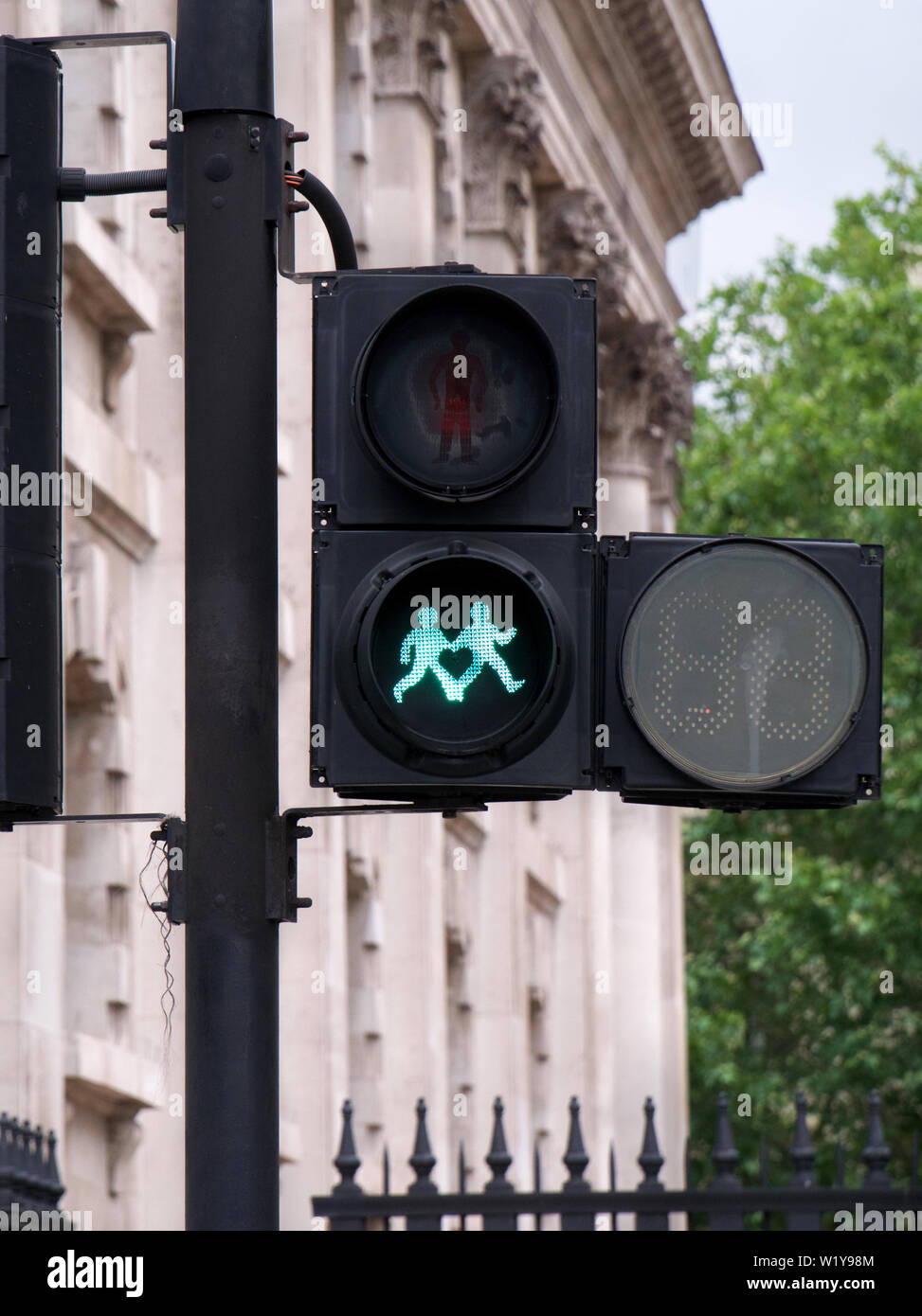 lgbt-friendly  road crossing signals in London's Trafalgar Square Stock Photo