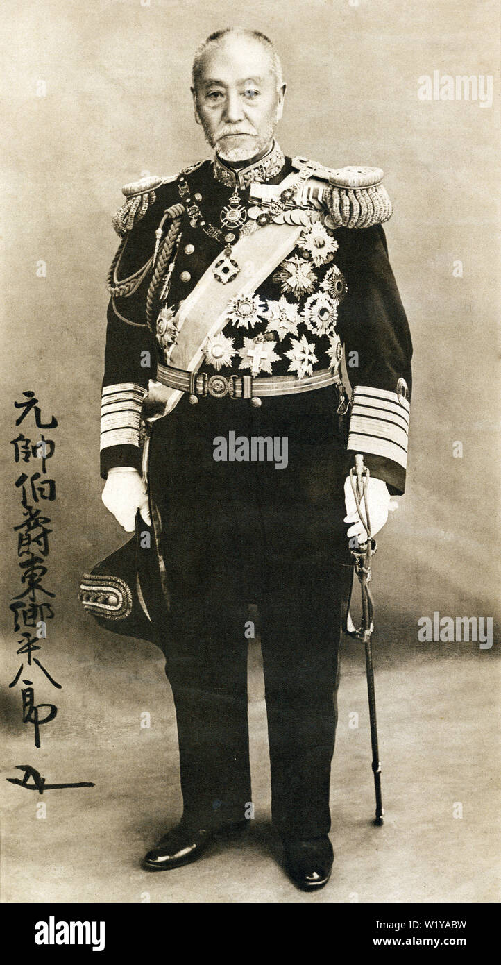 [ 1930s Japan - Heihachiro Togo ] —   Formal portrait of Fleet Admiral of the Imperial Japanese Navy, Heihachiro Togo (東郷平八郎, 1848-1934). Poster published by Osaka Mainichi Shimbun on Aug 5, 1934 (Showa 9), a few months after the admiral’s death on May 30.  Togo is one of Japan’s greatest naval heroes, coined the ‘Nelson of the East’ by Western journalists. He was instrumental in destroying the Russian Baltic Fleet at the Battle of Tsushima in 1905 during the Russo-Japanese War (1904-1905).  20th century vintage print. Stock Photo