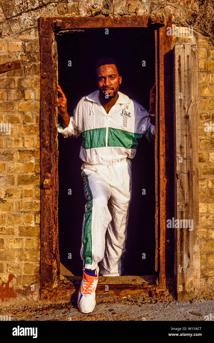 London, 1990. Portrait of boxer Nigel Benn. Nicknamed The Dark Destroyer, he held the WBO middleweight title in 1990, and the WBC super-middleweight t Stock Photo