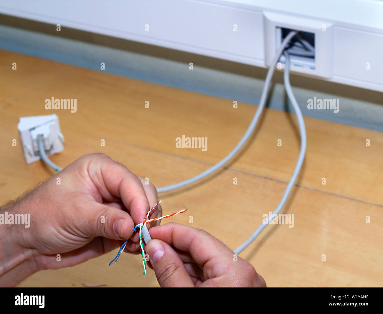 installation of Internet sockets in the cable channel Stock Photo