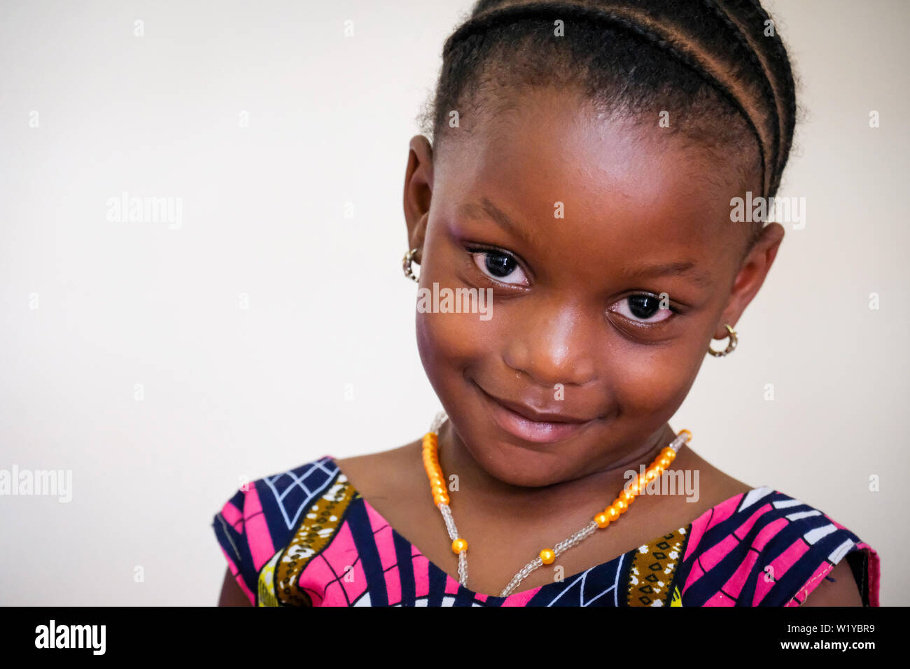 Nicely smiling African girl, 6 years old. Tanzania Stock Photo