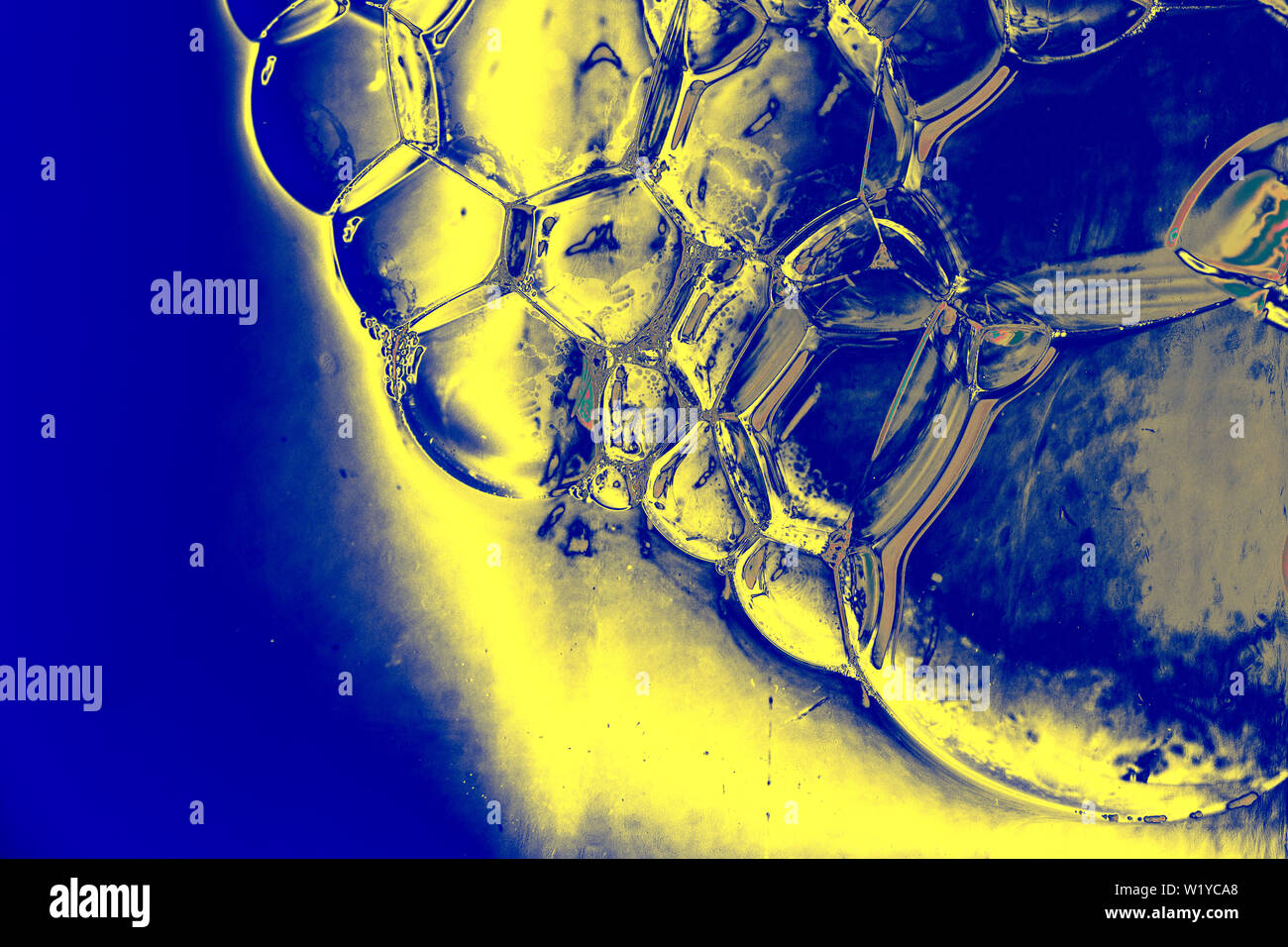 Oil bubbles inside water base form patterns Stock Photo - Alamy