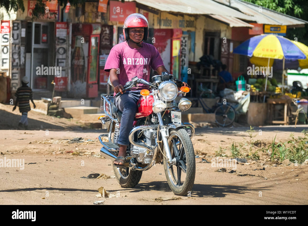 Motorcyclists in the streets of Mbeya, Tanzania.   ---   Motorradfahrer in den Straßen von Mbeya, Tansania. Stock Photo