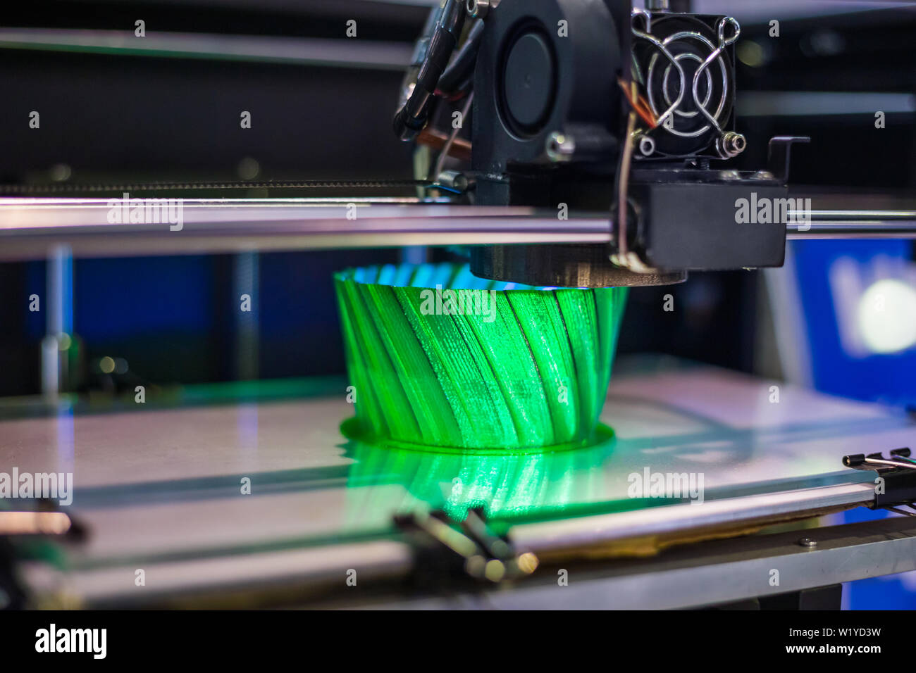 Three dimensional printing machine prints physical 3D model Stock Photo ...