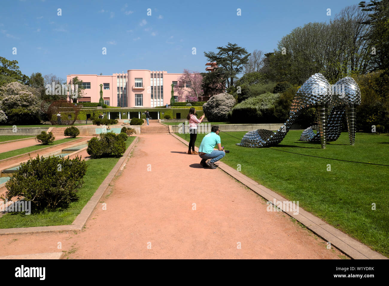 Tourists photographing 'Marilyn PA' by Joana Vasconcelos and art deco