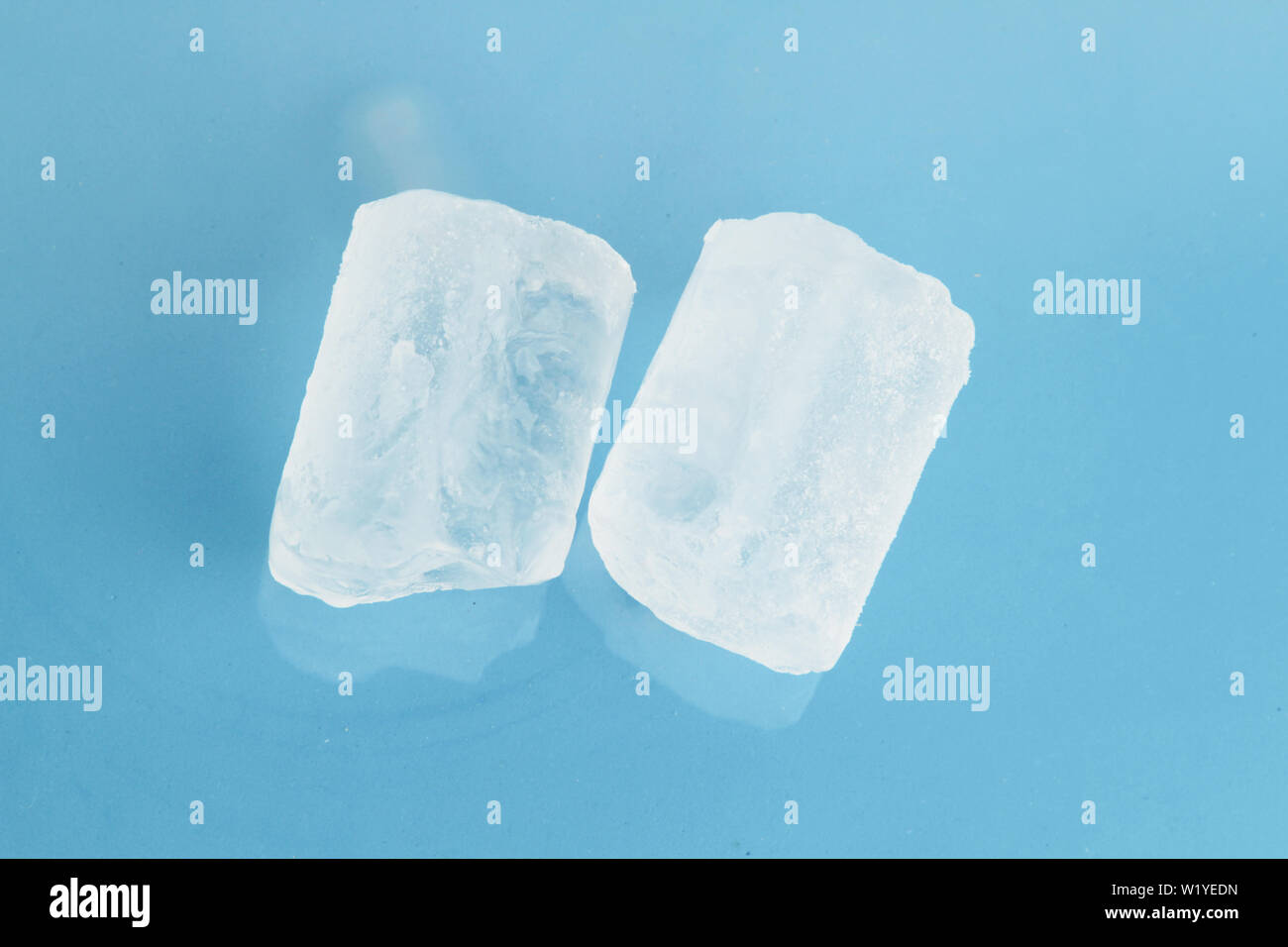 ice cubes on colorful background Stock Photo - Alamy