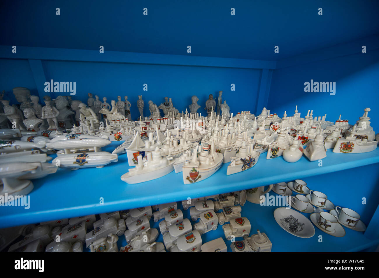 A large commercial collection of Goss pottery, otherwise known as