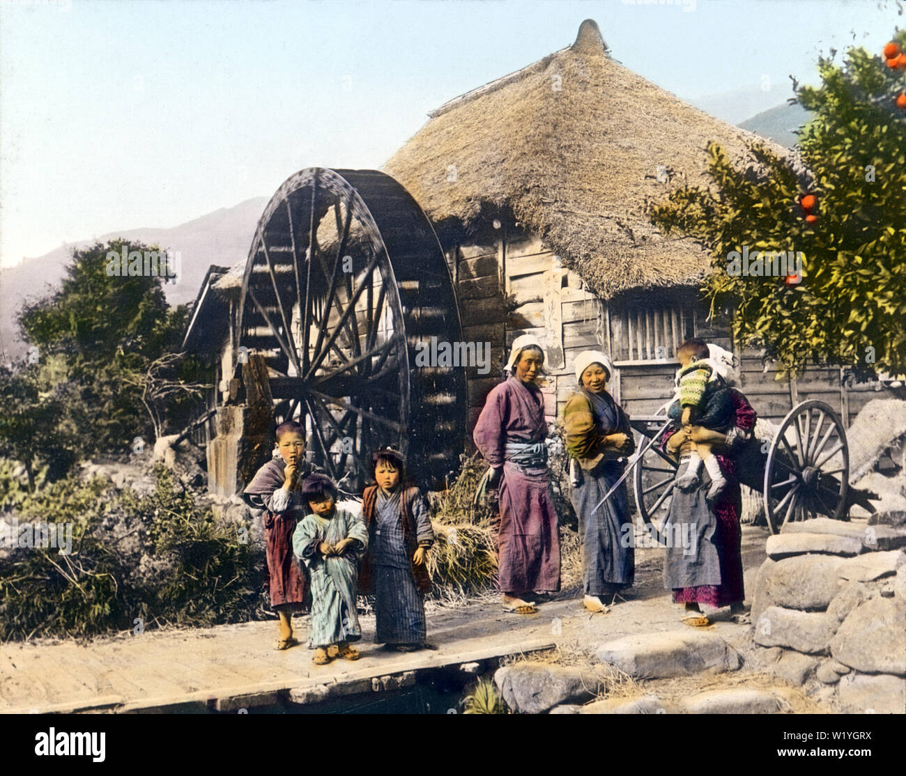 [ 1930s Japan - Japanese Grist Mill ] — Three women and four children ...