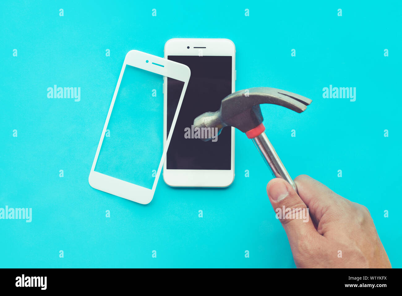 Male hand with hammer on tempered glass shield or film screen cover.Mobile  phone protector concepts ideas Stock Photo - Alamy