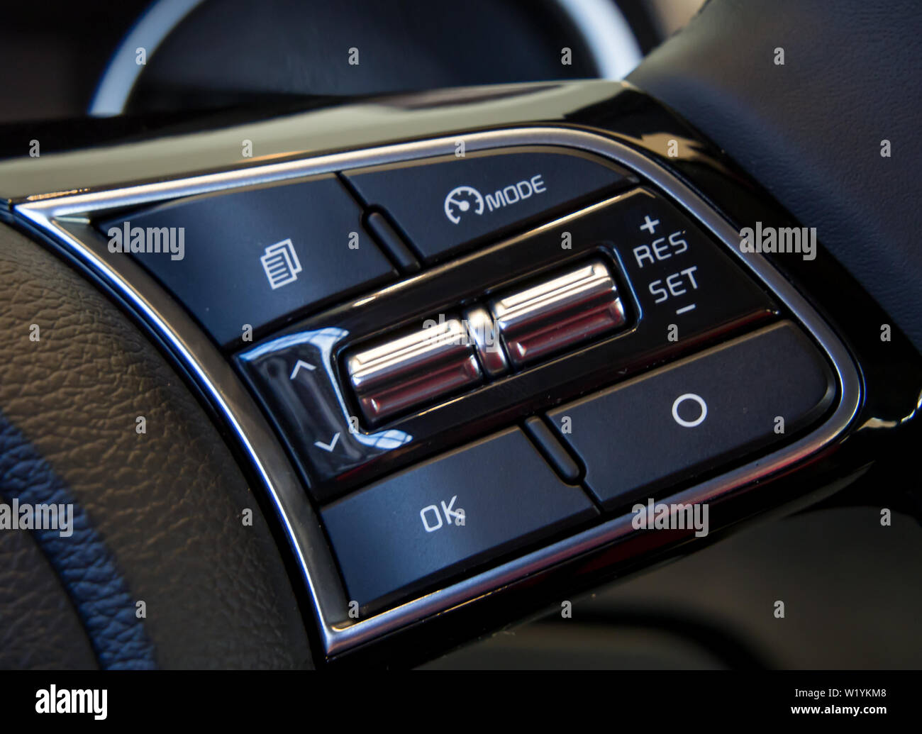 Cruise control buttons on the steering wheel Stock Photo Alamy