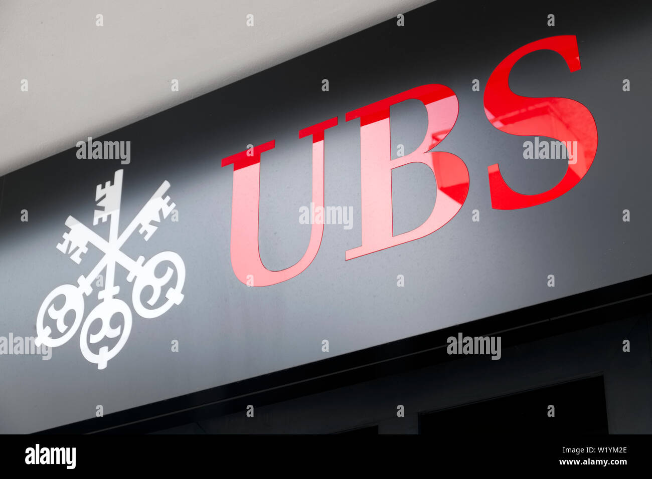 A sign for a branch of the UBS bank in Geneva Switzerland Stock Photo