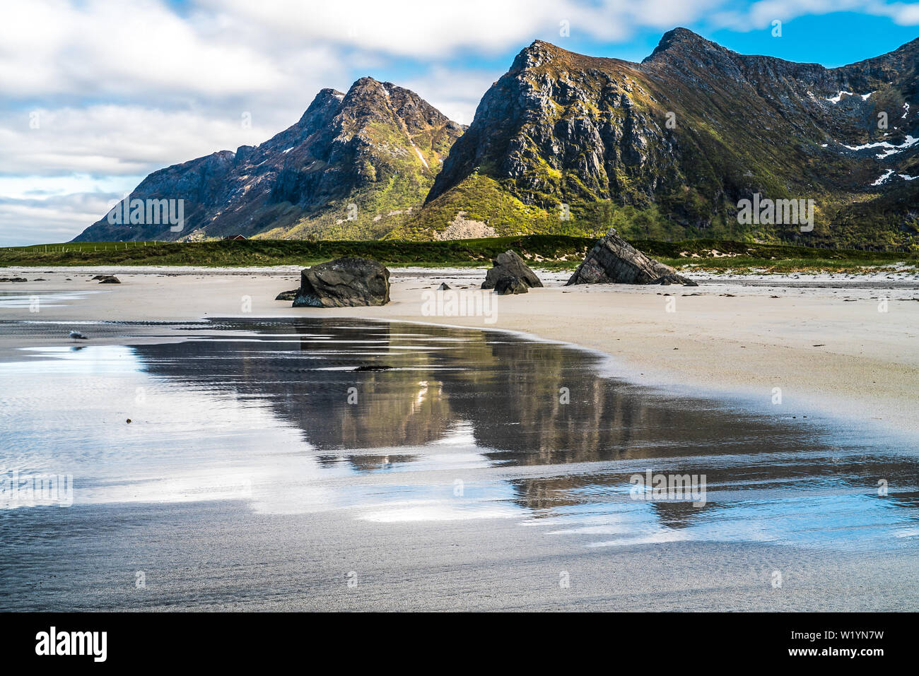 Long Exposure Flakstad Beach Lofoten Islands Norway On A Beautiful Spring Day With Reflections On The Wet Sand Stock Photo Alamy