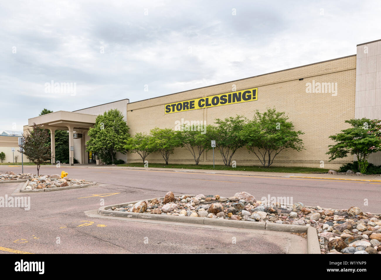 A retail store in a suburban shopping mall that has closed for business. Stock Photo
