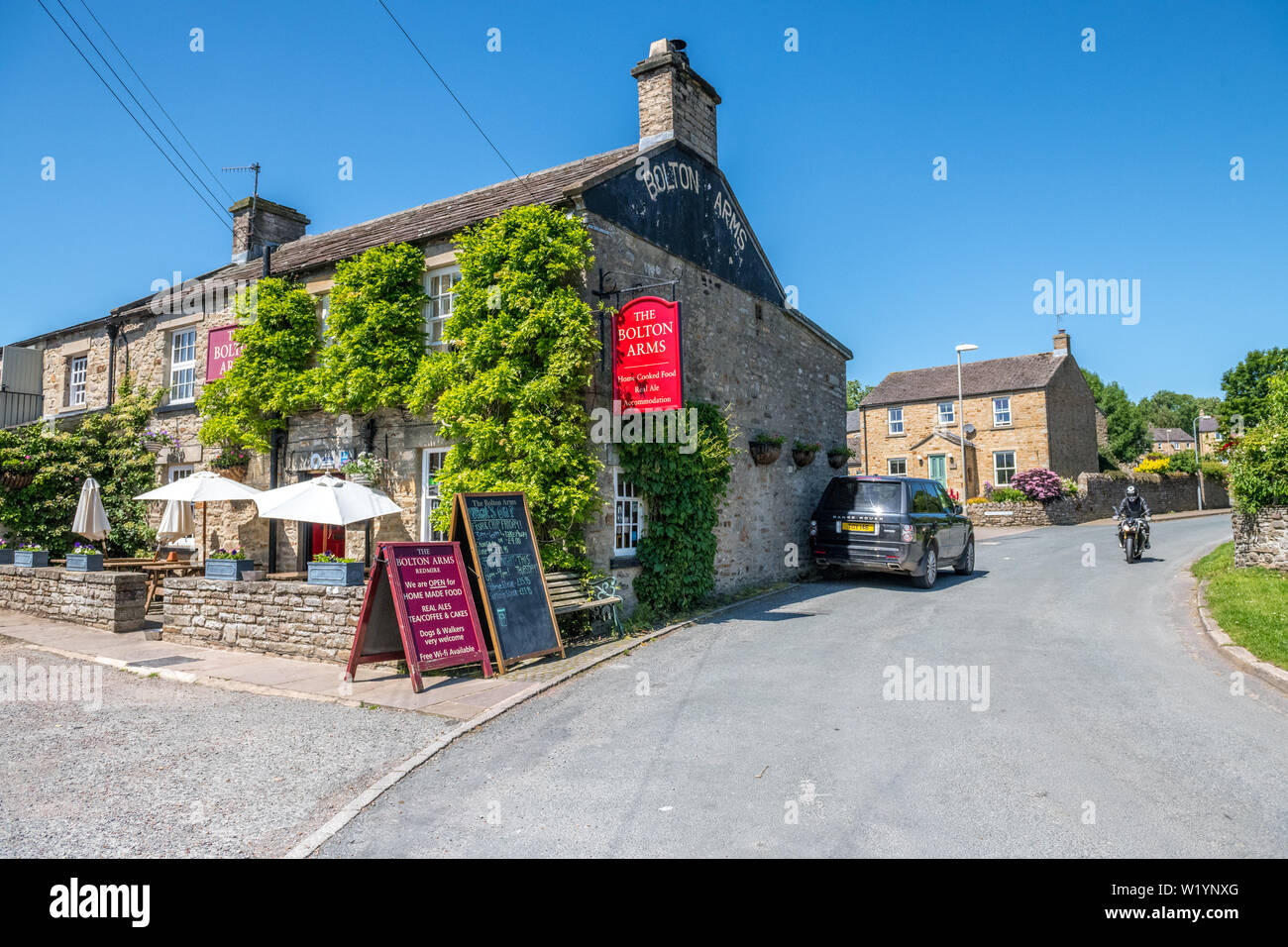 The Bolton Arms, a village pub in the Yorkshire Dales village of Redmire, Yorkshire, England, UK. Stock Photo
