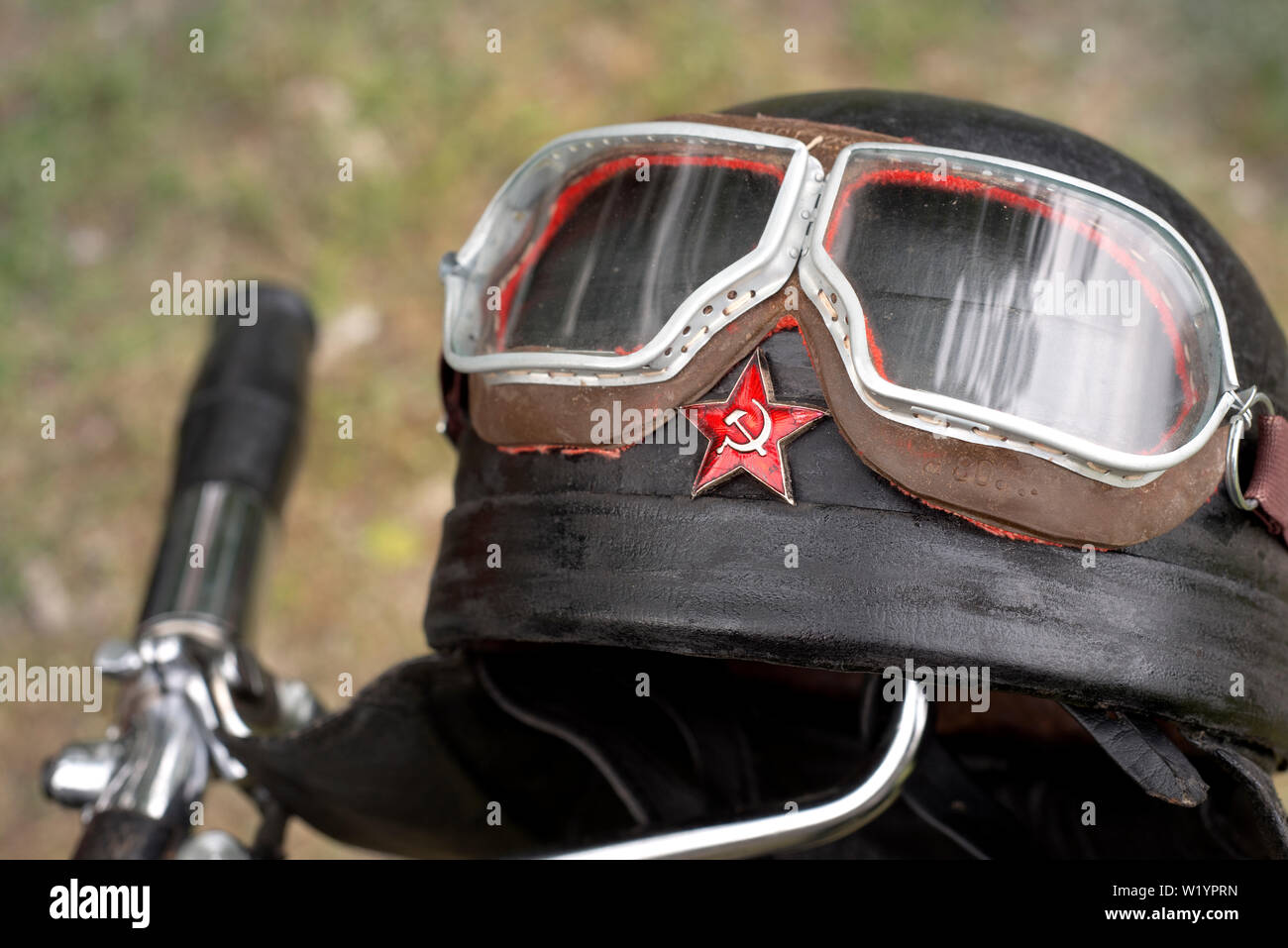 Italy, Lombardy, Meeting of Vintage Motorcycle, Helmet with Red Star and Hammer and Sickle Symbol of the Soviet Union Stock Photo