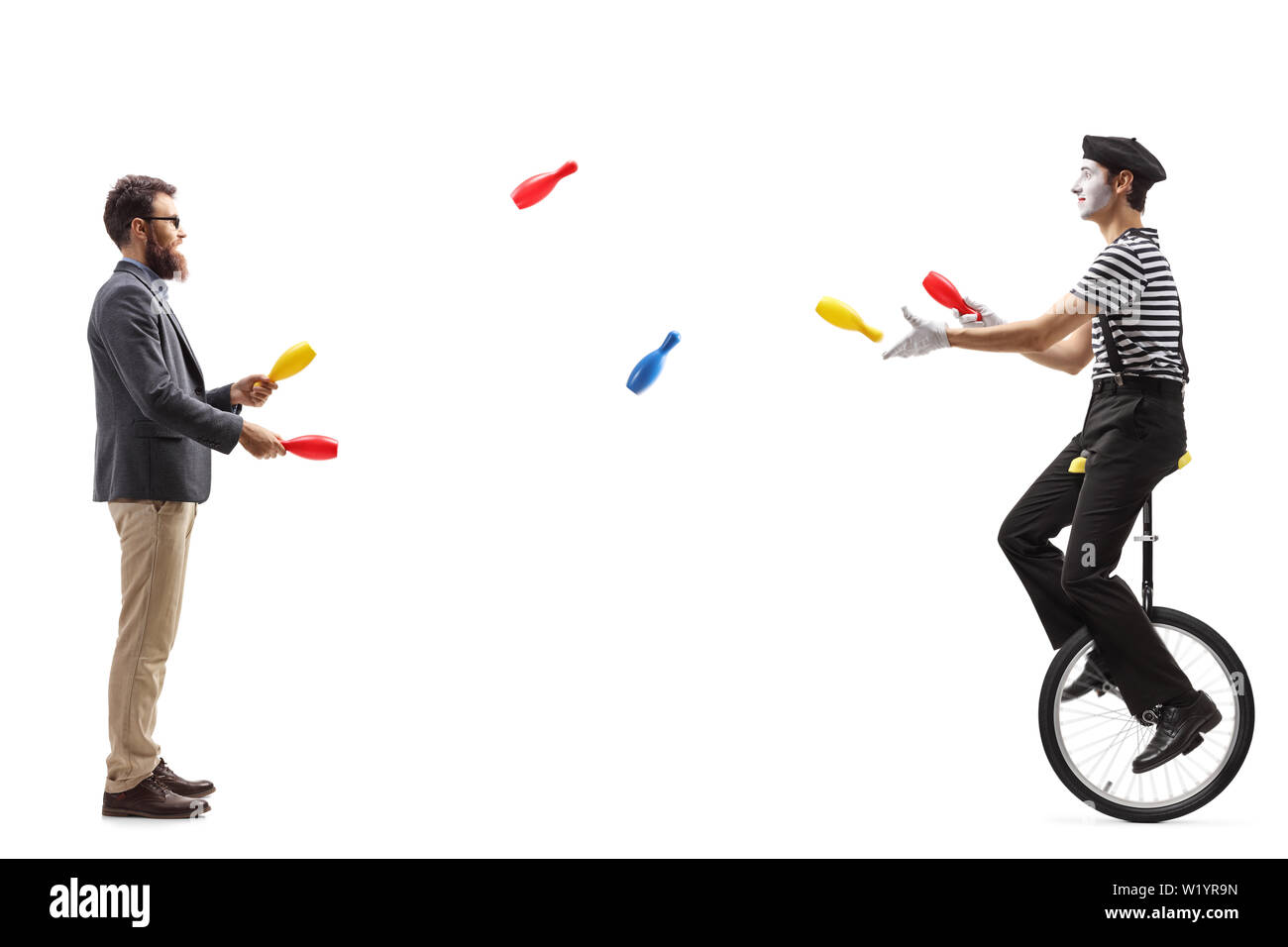 Juggling on a unicycle Cut Out Stock Images & Pictures Alamy