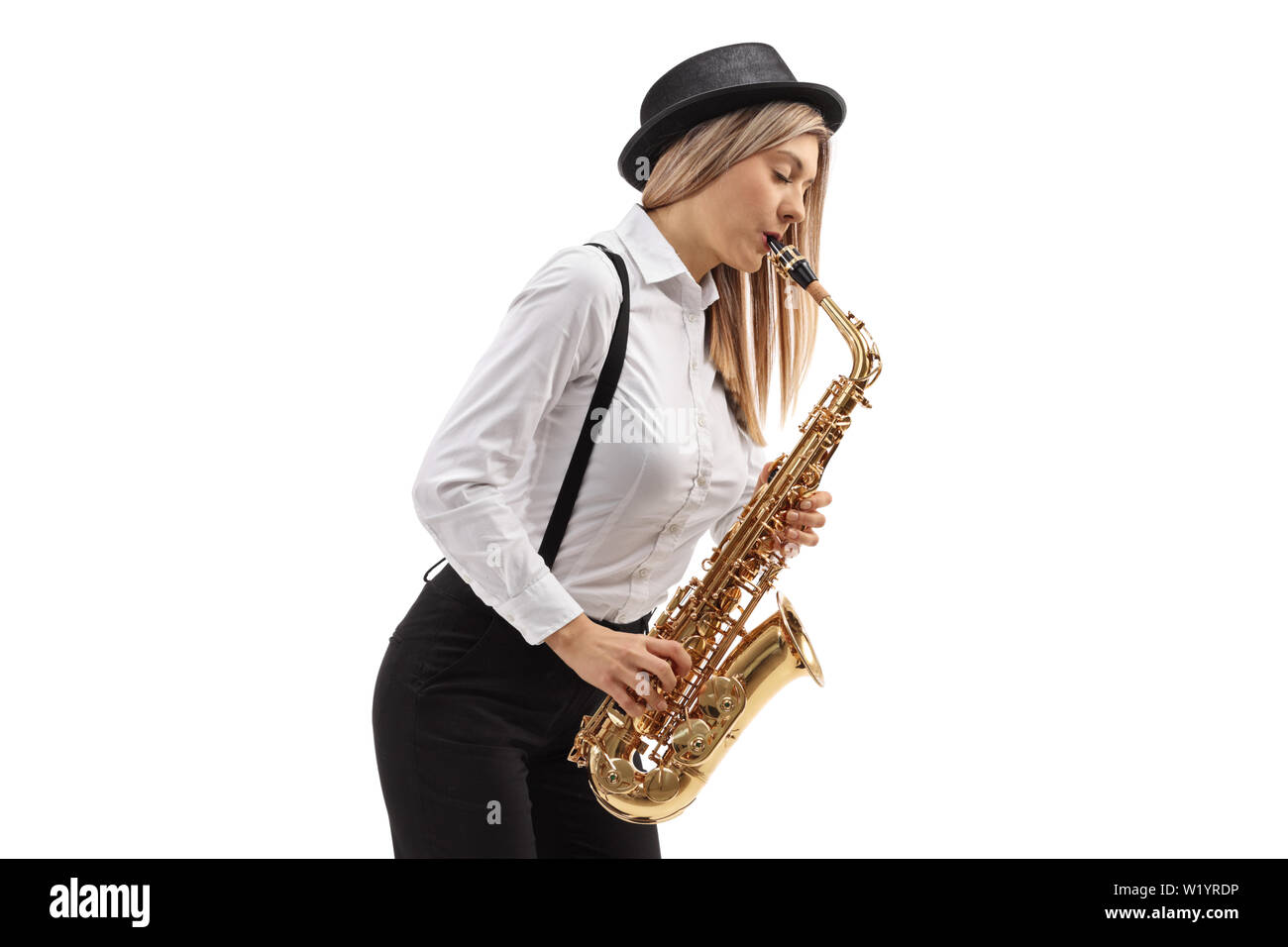 Young female jazz musician playing a saxophone isolated on white background Stock Photo