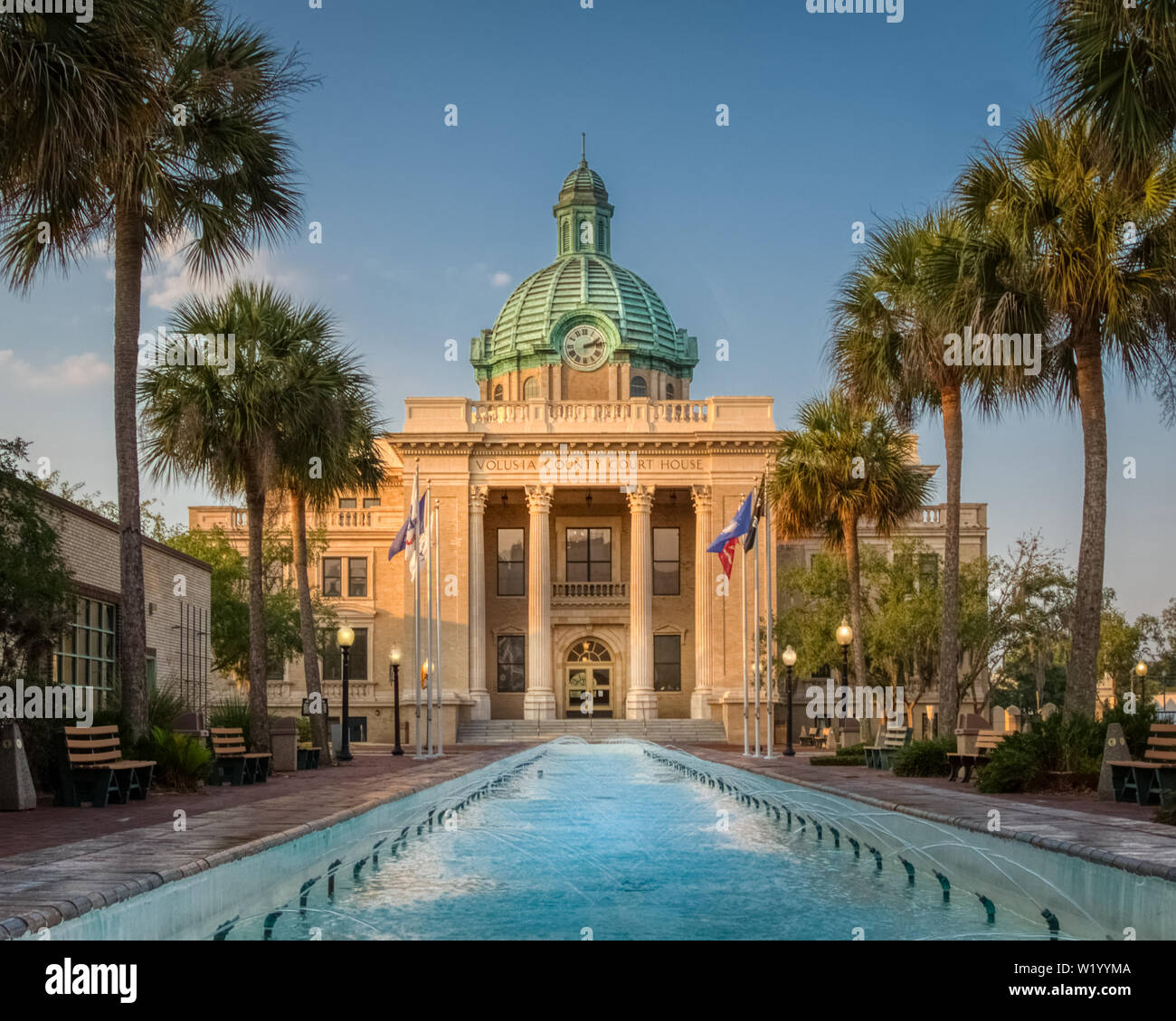 Classical vintage Volusia County Courthouse in DeLand Florida with columns and copper dome from