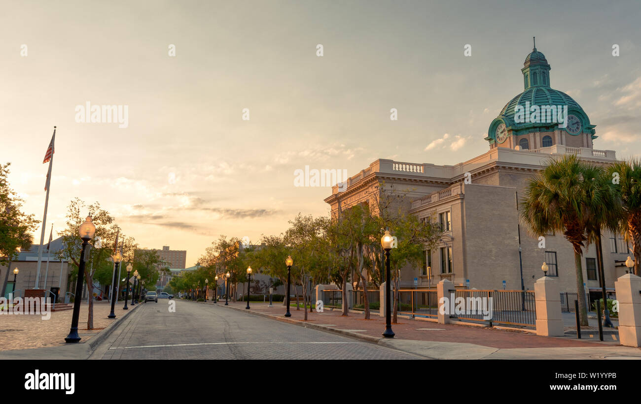 Historic DeLand Courthouse taken from the street at sunrise in small town of Deland Florida Stock Photo