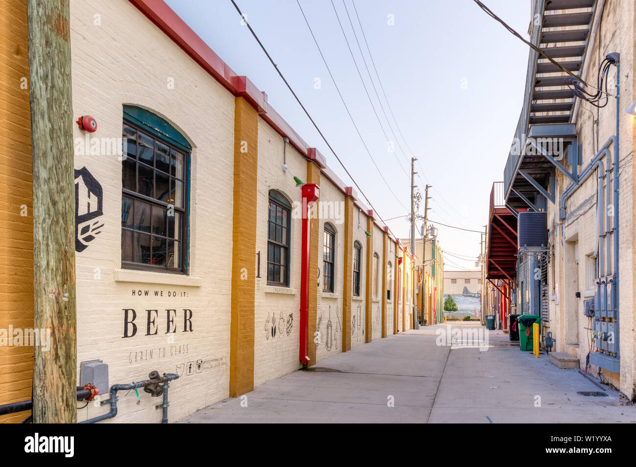 Alley of Persimmon Hollow Brewing Company beer wall art in historic DeLand, Florida Stock Photo