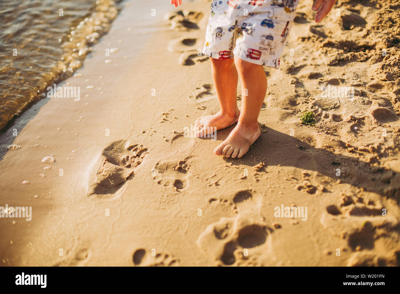 baby footprints in sand