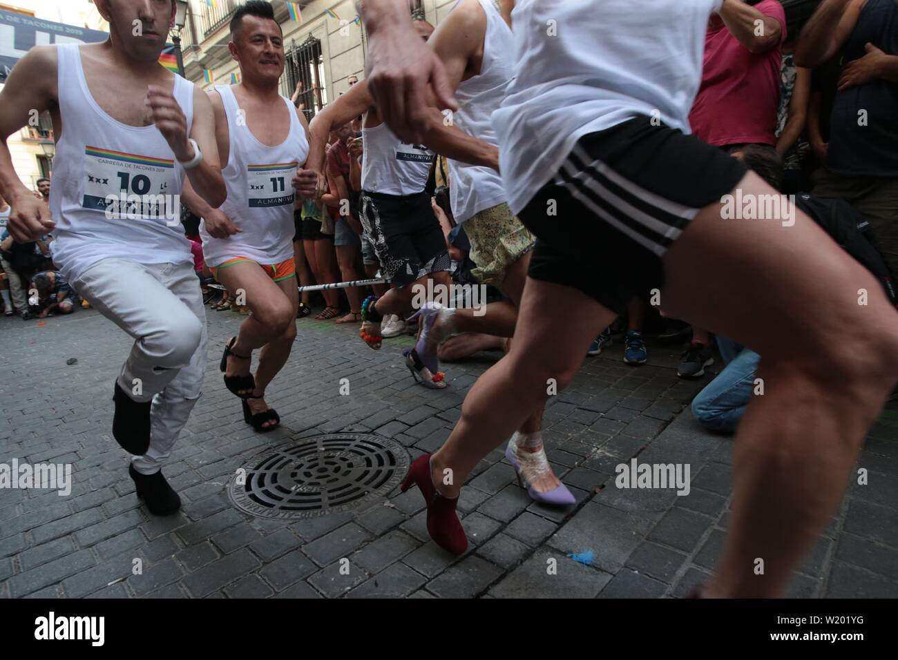 Madrid, Spain. 04th July, 2019. Madrid Spain; 04/07/2019.- High heels race at the Gay Pride celebrations in Madrid, activities prior to the parade on the 7th one of the great festivities of Madrid. Credit: Juan Carlos Rojas/Picture Alliance | usage worldwide/dpa/Alamy Live News Stock Photo