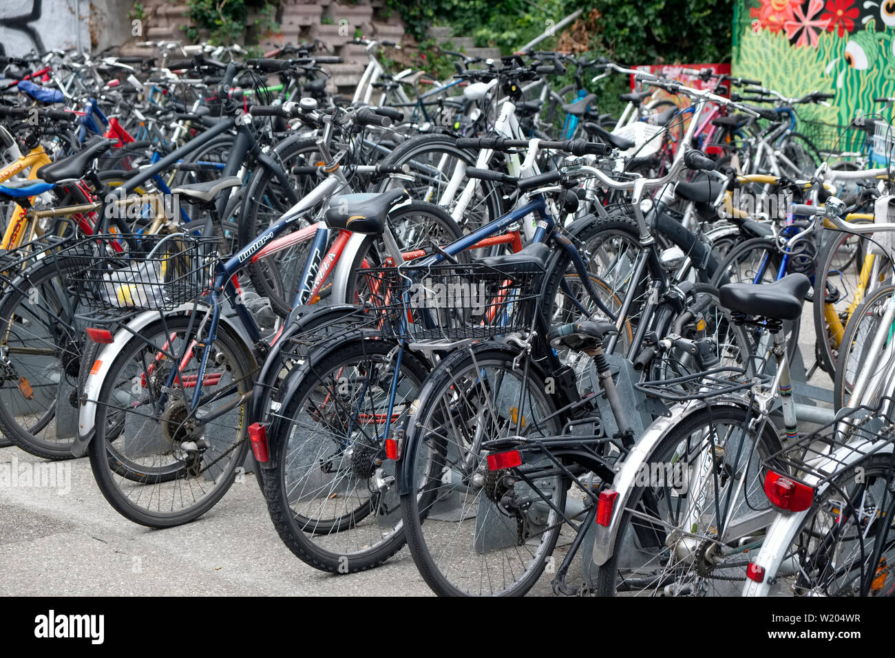 Bikes parked in a bike park next to Cornavin railway station in Geneva Switzerland Stock Photo