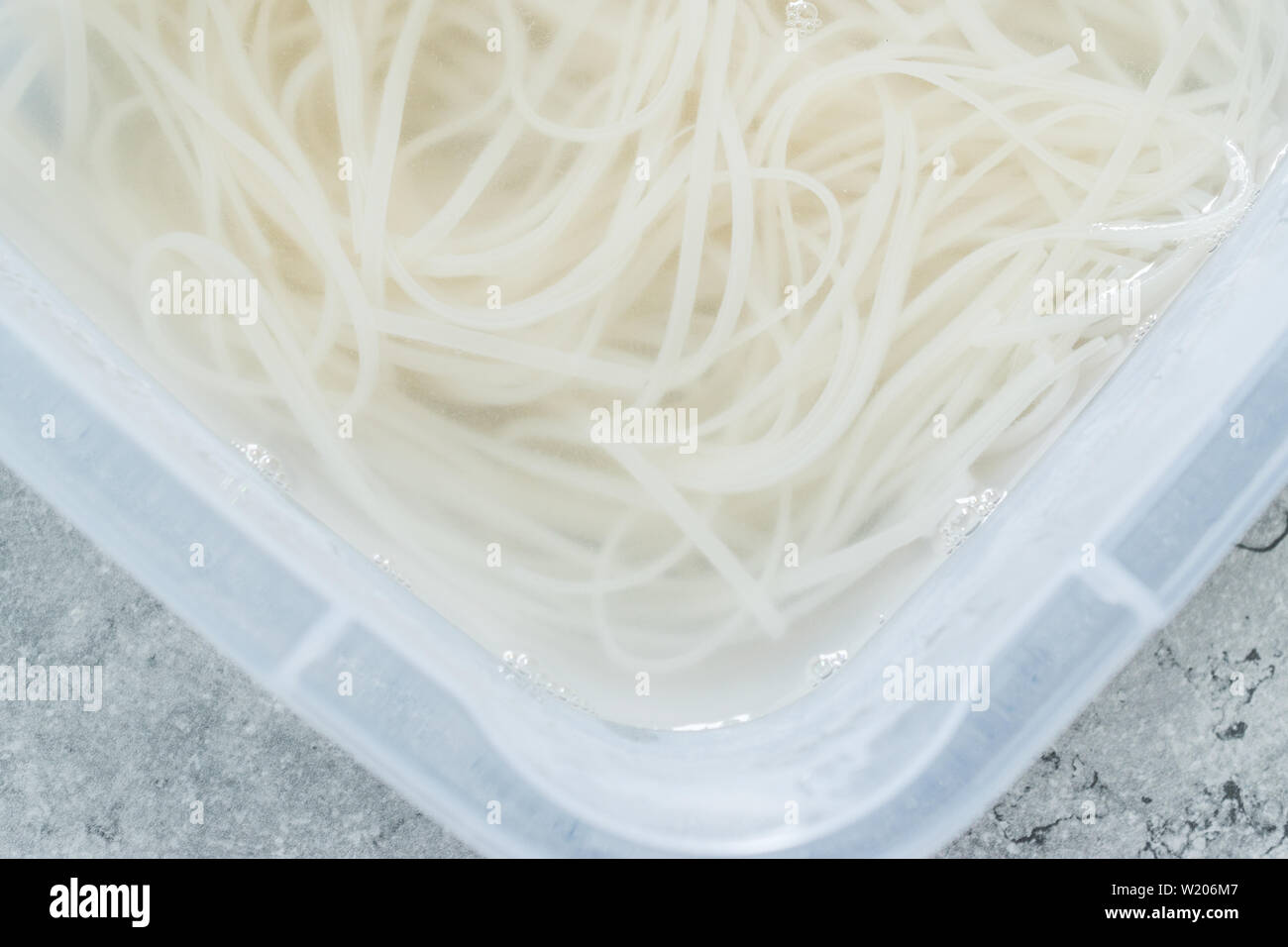 Rice Noodle in Boiling Water Ready to Use. Organic Food Stock Photo Alamy