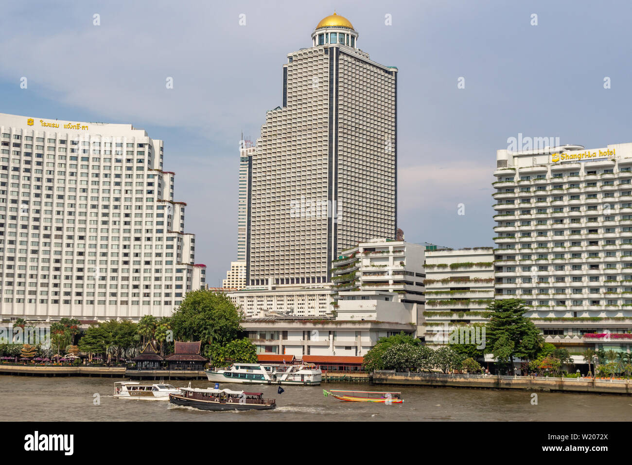 Bangkok, Thailand - April 14, 2019: State tower skyscraper seen from the Chao Praya river Stock Photo