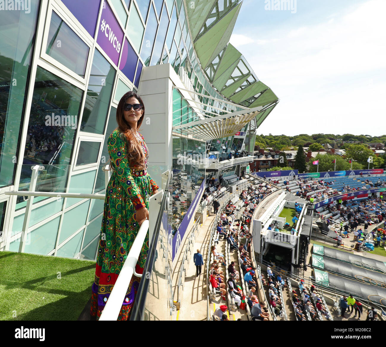 Leeds, UK. 04th July, 2019. An Afghanistan reporter dressed in a traditional Afghan dress. during the Afghanistan v West Indies, ICC Cricket World Cup match, at Headingley, Leeds, England. Credit: csm/Alamy Live News Stock Photo