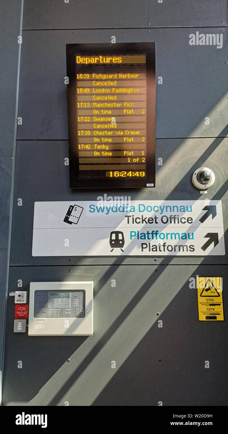 Margam, Wales, UK. 3rd July, 2019. A tv screen with a list of cancelled services at Port Talbot Parkway railway station in south Wales, UK. Wednesday 03 July 2019 Re: Two rail workers have died after being hit by a passenger train between Port Talbot Parkway and Bridgend stations in south Wales, UK. The pair were struck near Margam by the Swansea to London Paddington train at about 10am. They were pronounced dead at the scene and a third person was treated for shock, but was not injured. Credit: ATHENA PICTURE AGENCY LTD/Alamy Live News Stock Photo