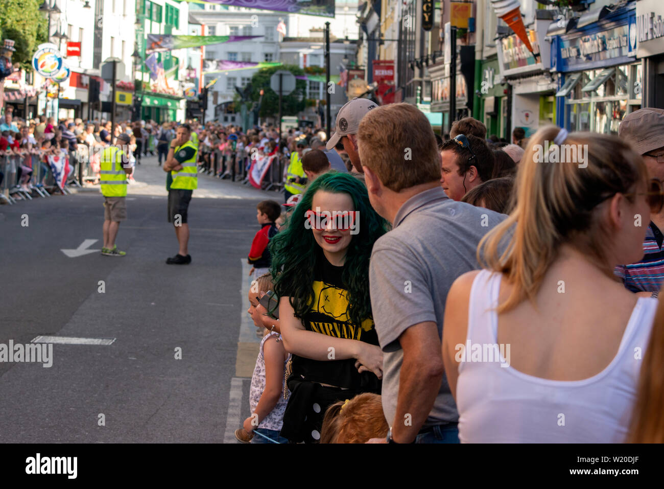 Spectators on High Street in Killarney, County Kerry, Ireland expecting the Parade for the 4th of July and Independence Day celebrations Stock Photo