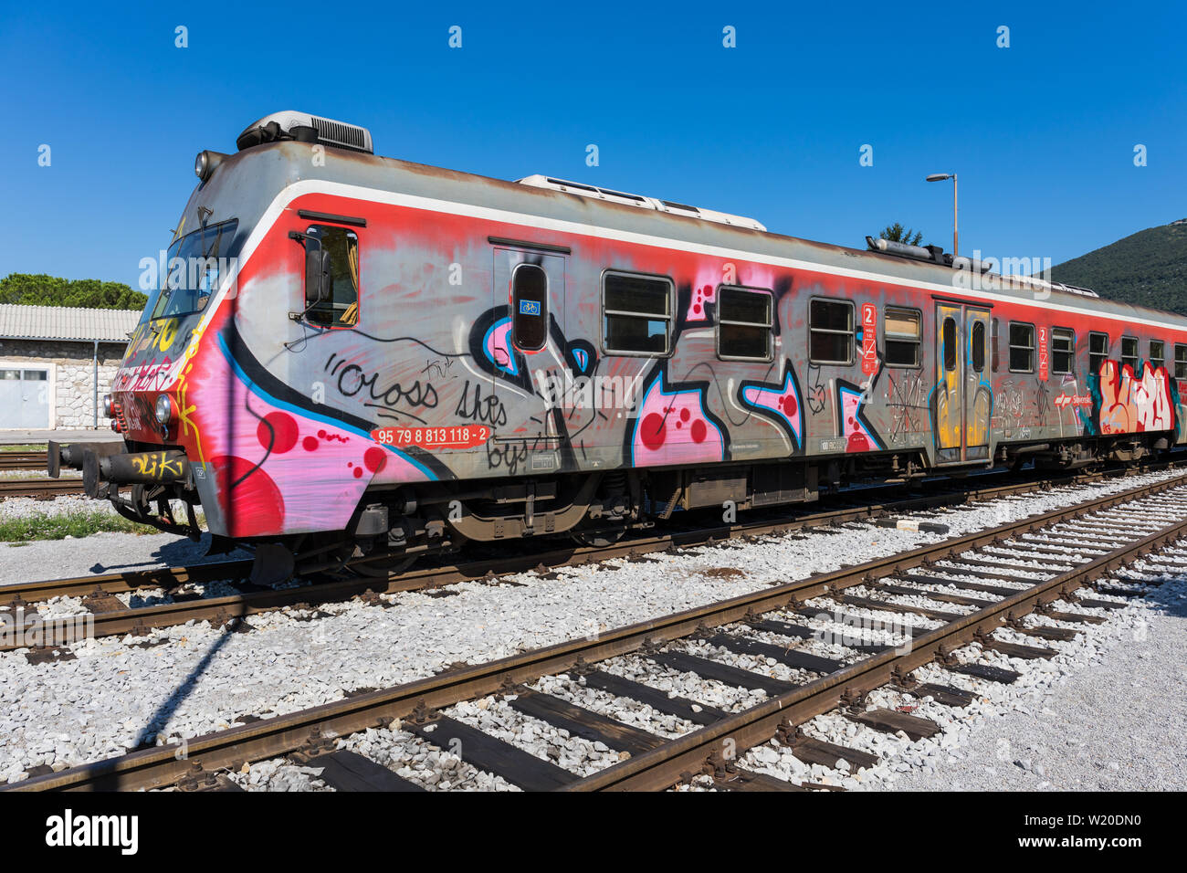 Graffiti covered train at the railway station in Nova Gorica, Slovenia Stock Photo