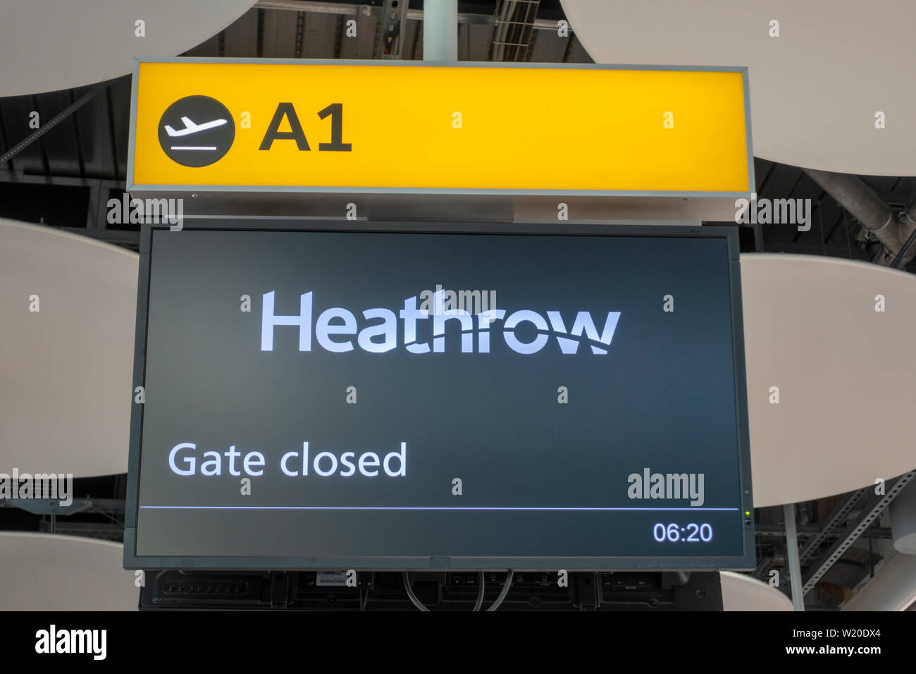 Gate board for gate A1 at Terminal Five, London Heathrow Airport, UK. Stock Photo