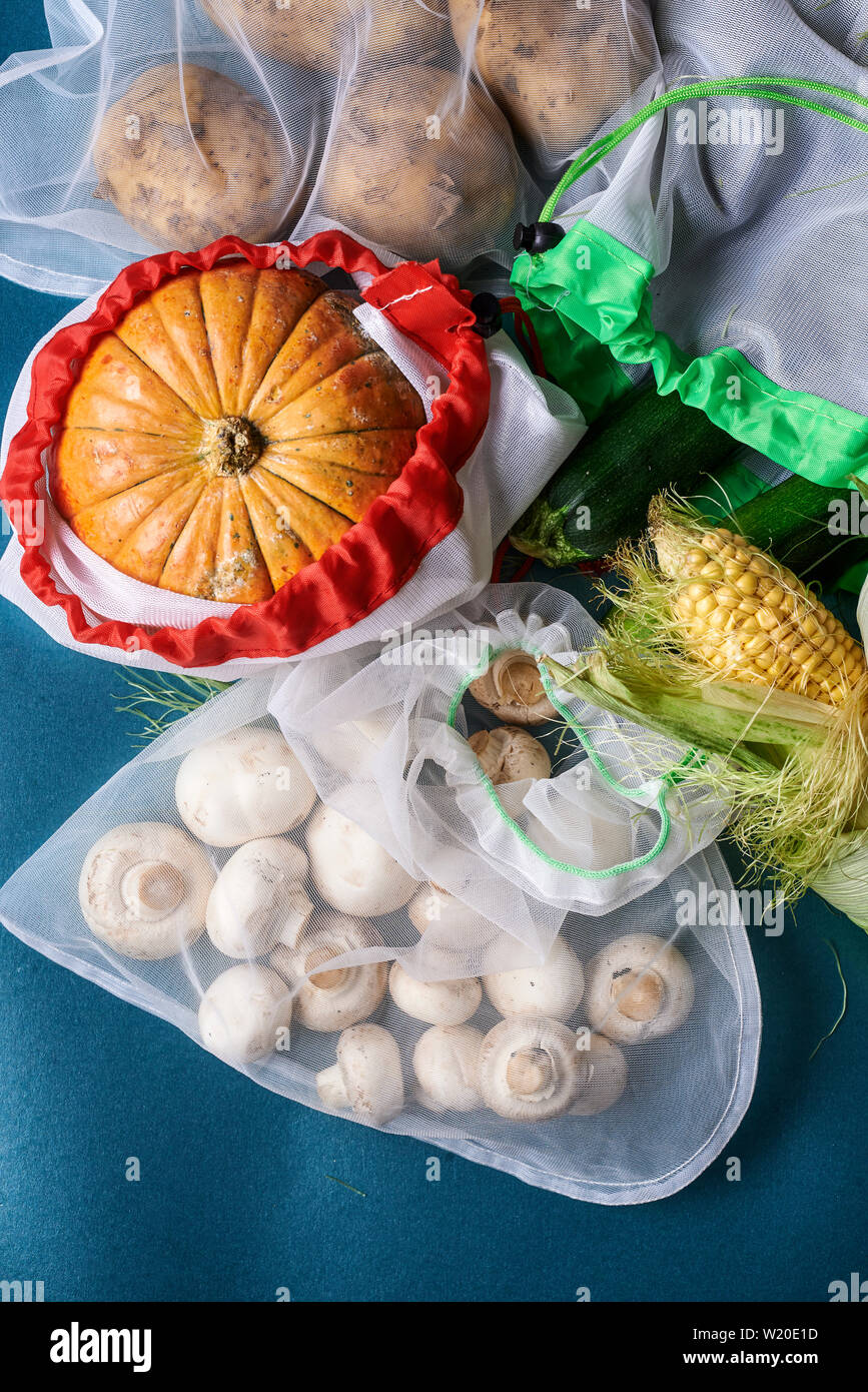 vegetables in reusable bags. zero waste concept. top view Stock Photo ...