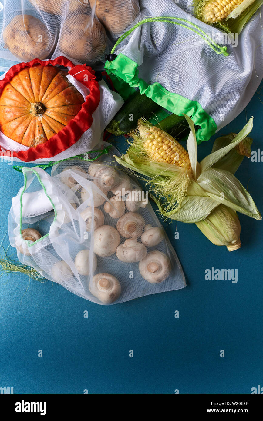 vegetables in reusable bags. zero waste concept. top view Stock Photo ...