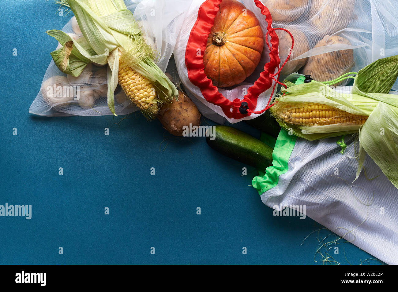 vegetables in reusable bags. zero waste concept. top view Stock Photo ...