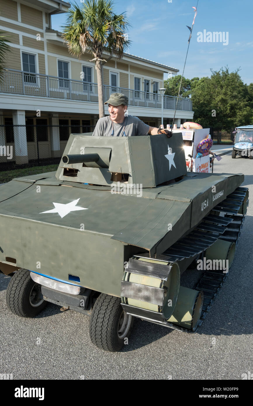 A golf cart decorated as a military tank takes part in the  annual Independence Day parade July 4, 2019 in Sullivan's Island, South Carolina. The tank was a tongue-in-check reference to the controversy over the military parade in Washington. Stock Photo