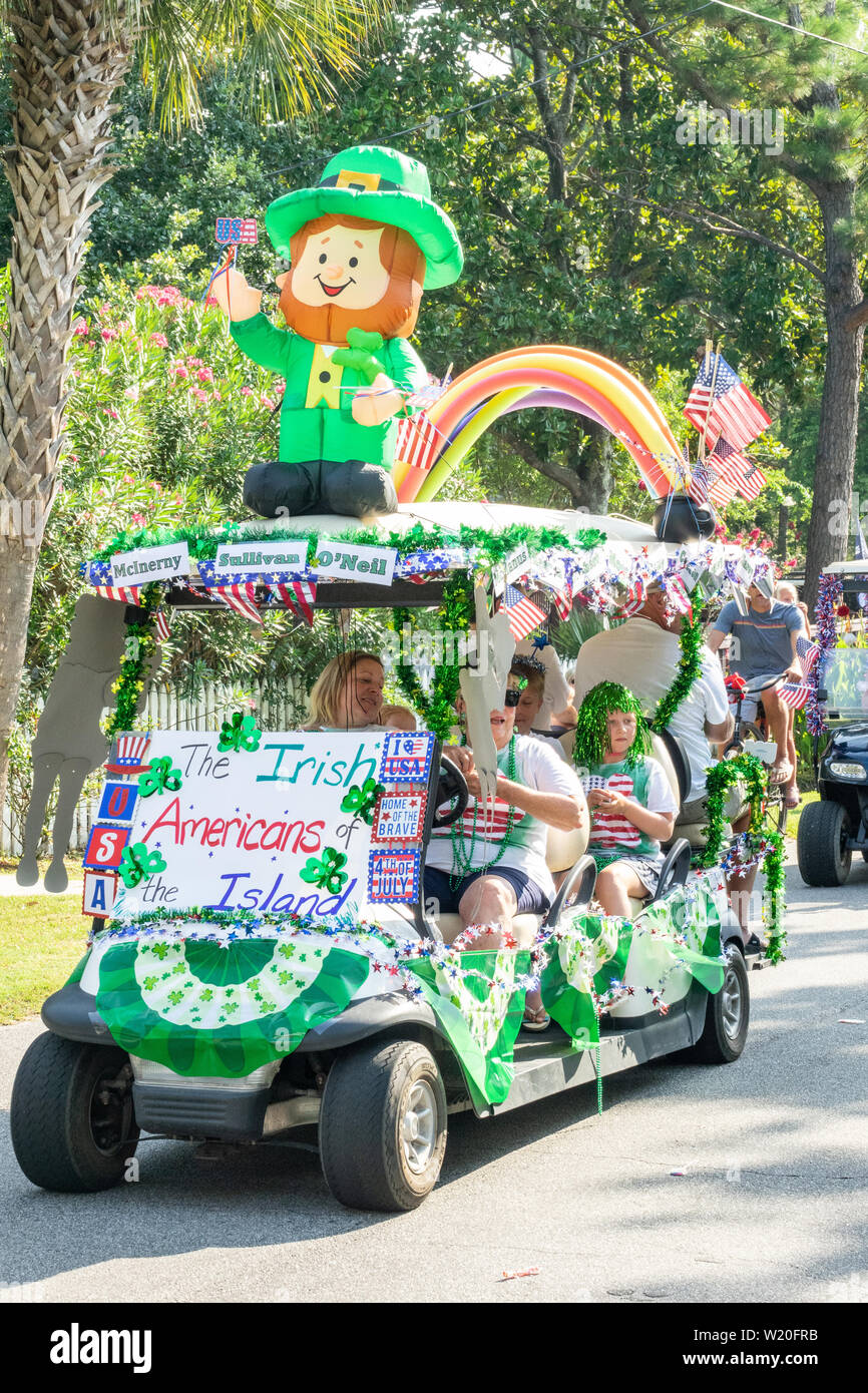 A golf cart float decorated in Irish themes during the annual Independence Day golf cart and bicycle parade July 4, 2019 in Sullivan's Island, South Carolina. The tiny affluent Sea Island beach community across from Charleston holds an outsized golf cart parade featuring more than 75 decorated carts. Stock Photo