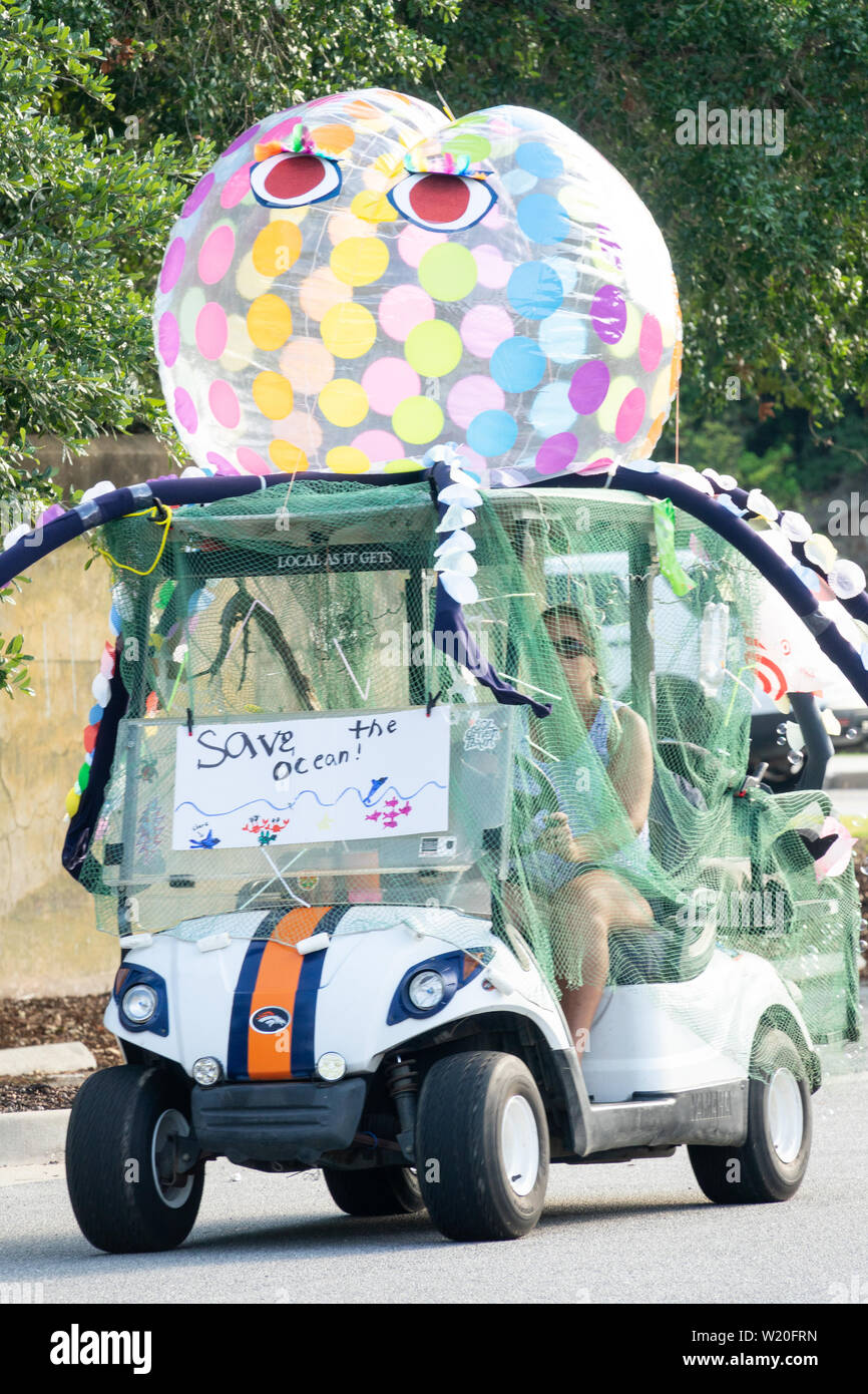 A golf cart float decorated as an octopus during the annual Independence Day golf cart and bicycle parade July 4, 2019 in Sullivan's Island, South Carolina. The tiny affluent Sea Island beach community across from Charleston holds an outsized golf cart parade featuring more than 75 decorated carts. Stock Photo