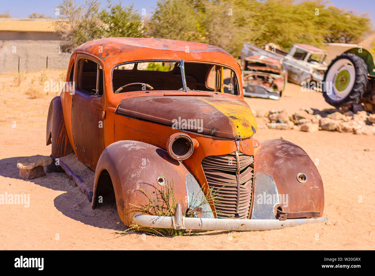 Rusty car in the car park at Solitaire, Sesriem, Namibia Stock Photo