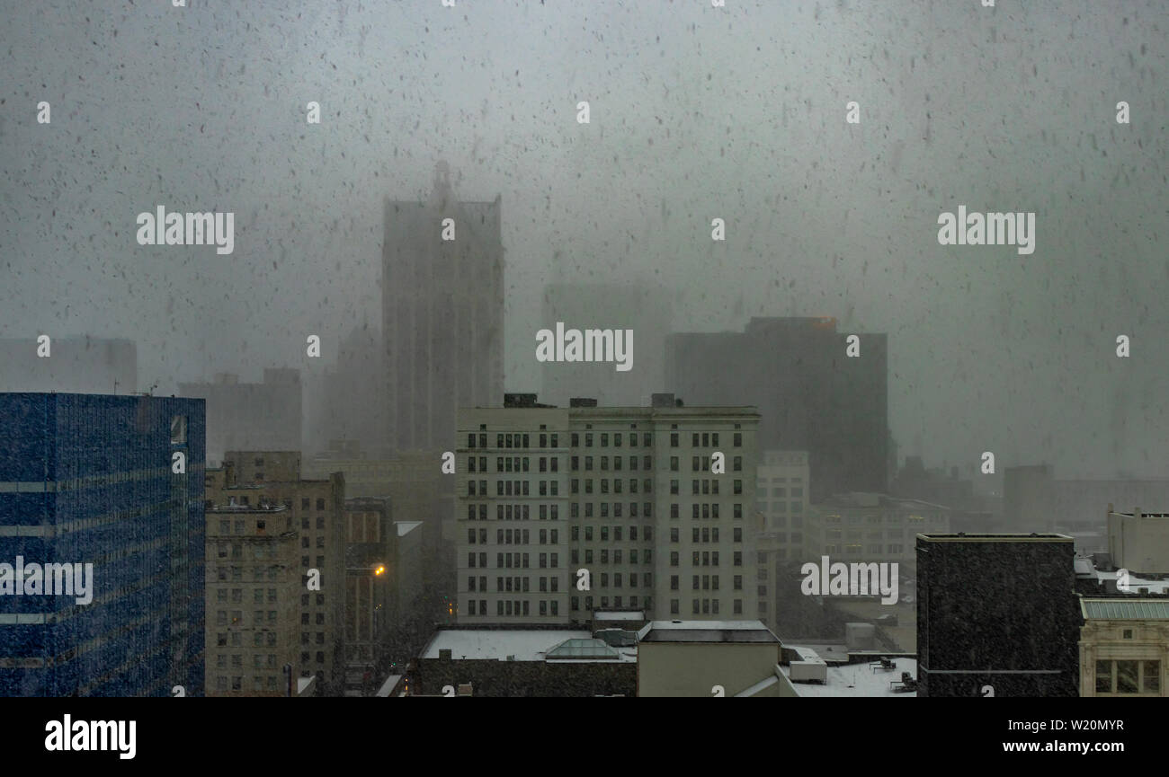 Downtown Milwaukee Skyline during a snow storm on a dreary spring afternoon, Wisconsin, USA. Stock Photo