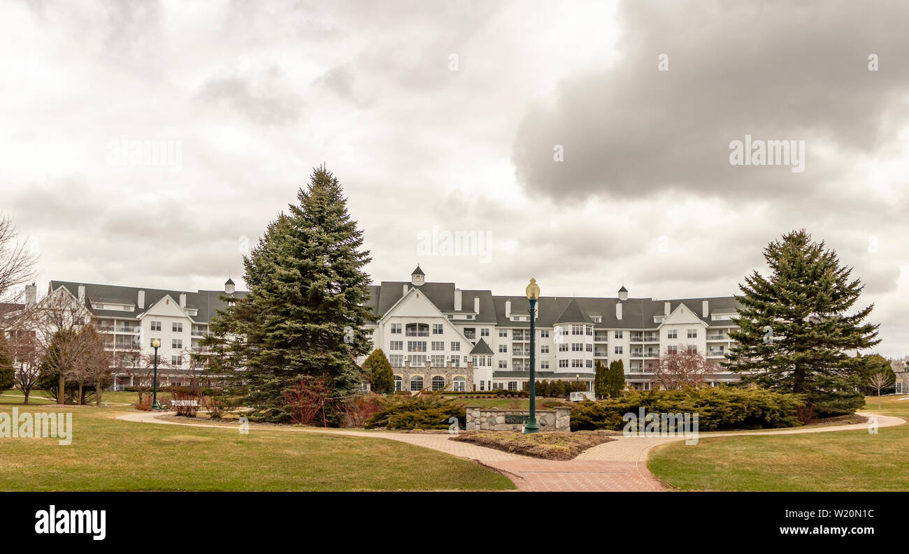 Elkhart Lake, Wisconsin, USA - April 13th, 2019: Osthoff Resort and Spa overlooking Elkhart Lake. Stock Photo