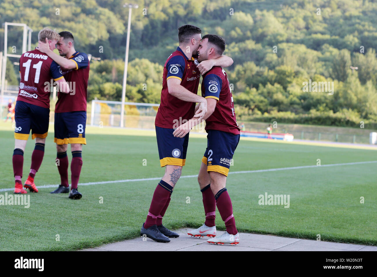 Cardiff, UK. 04th July, 2019. Dylan Rees of Cardiff Met (right) celebrates  with teammate Joel Edwards after he scores his teams 2nd goal from the  penalty spot. UEFA Europa league preliminary qualifying