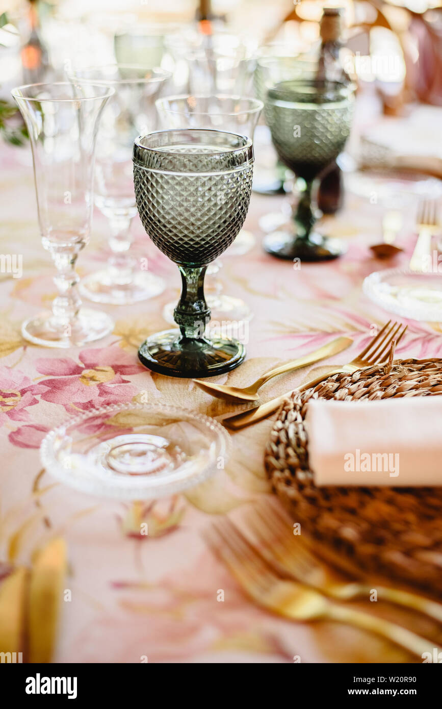 Elegant cutlery and floral arrangements for a table in a wedding