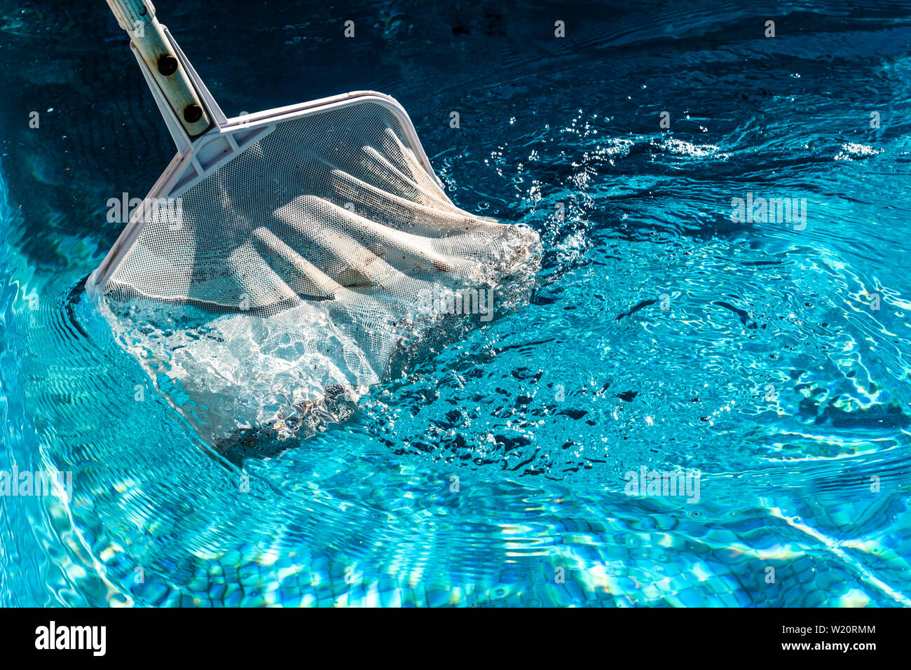 Pool skimmer net hi-res stock photography and images - Alamy